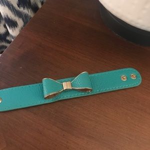 Leatherette bow bracelet